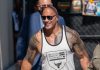 Dwayne Johnson returns to the store where he stole candy bars as a child and spends $300